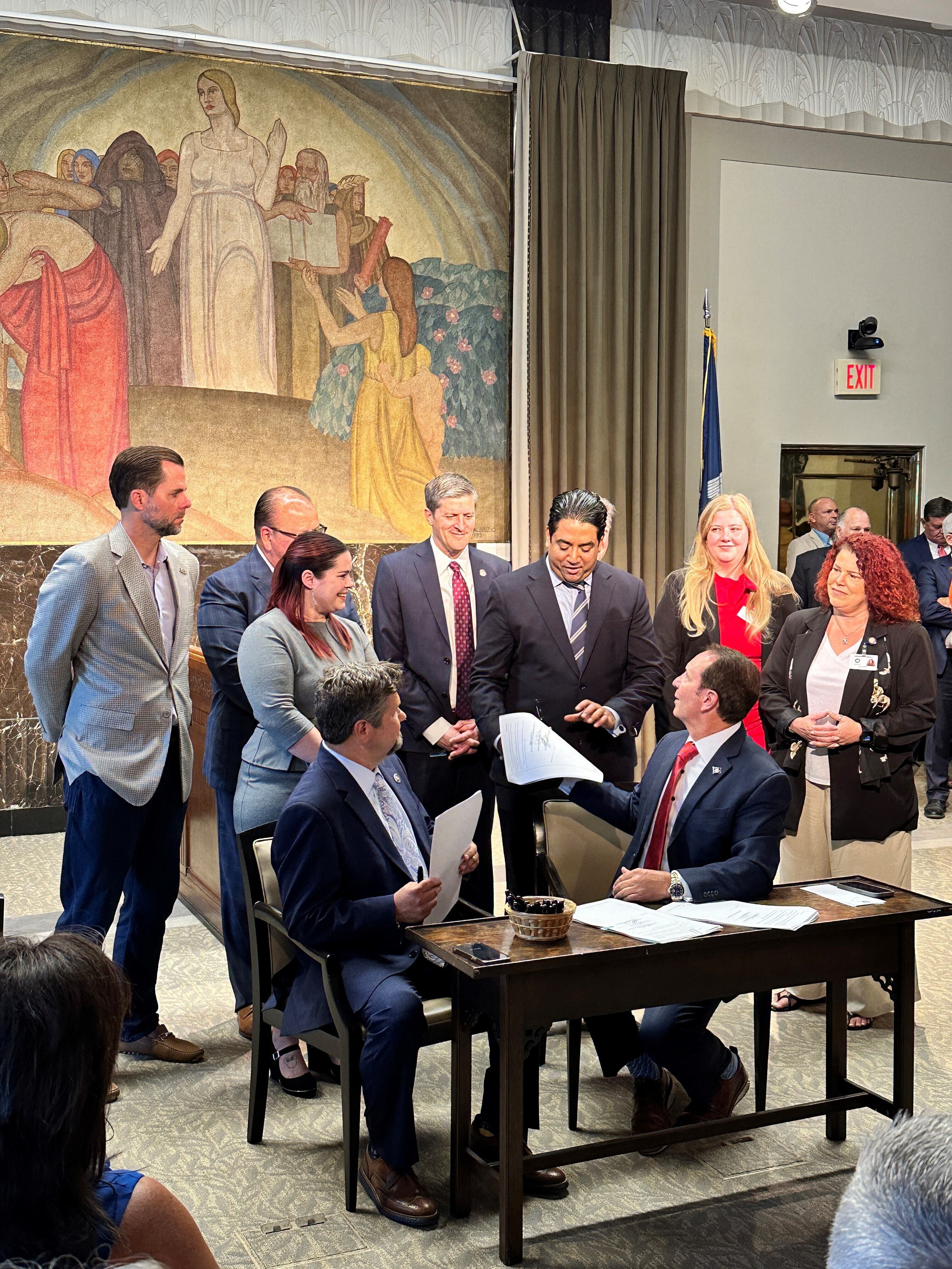 ConnectLA's Executive Director, Veneeth Iyengar, attending a bill signing.