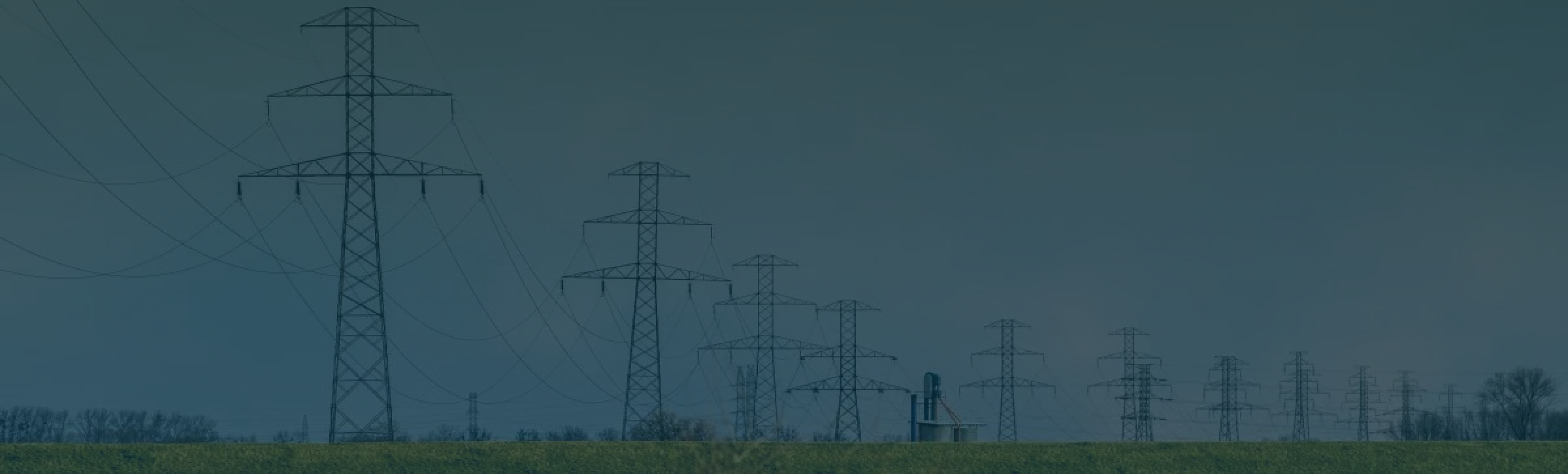 A perspective view of a landscape of transmission towers