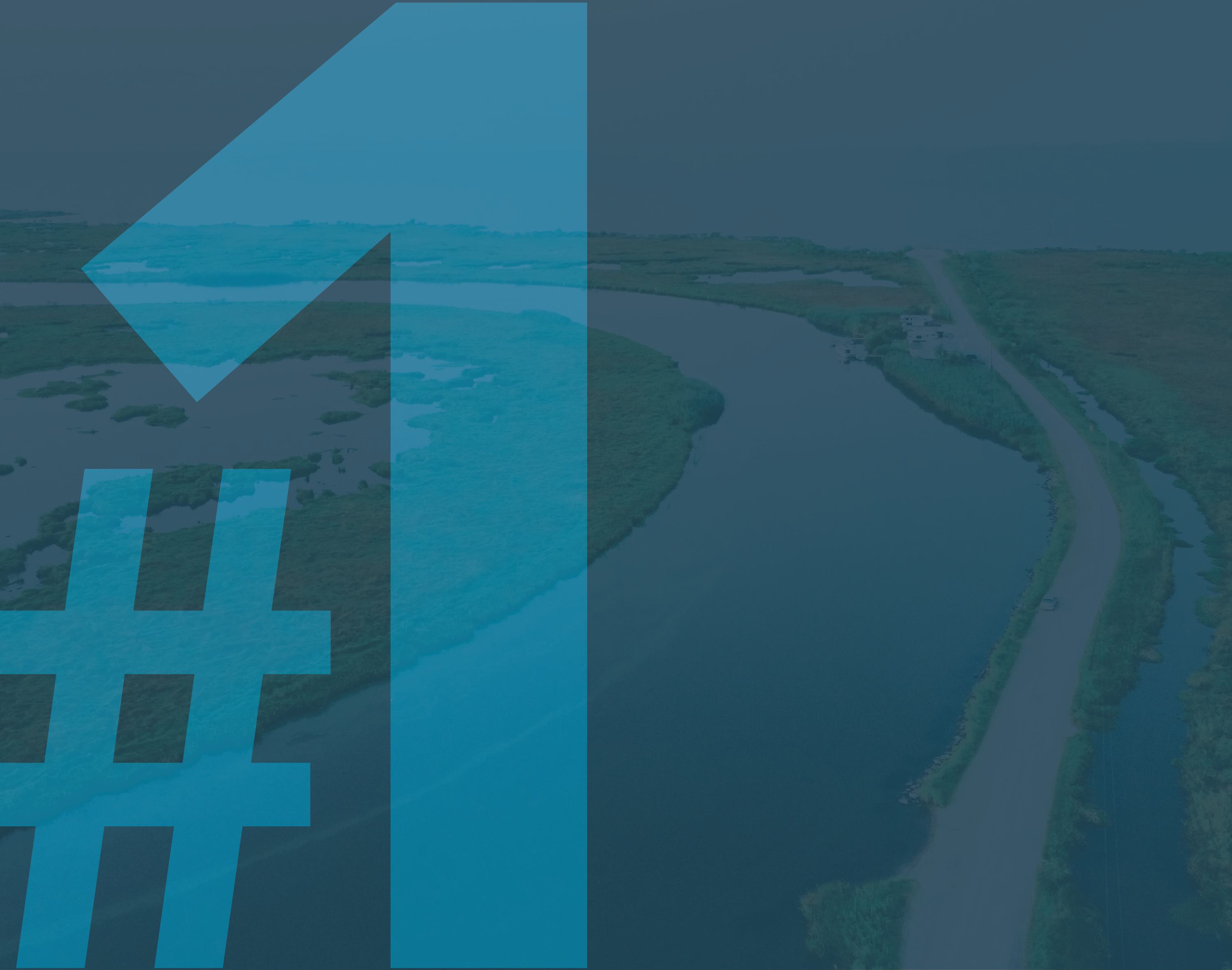 A background aerial view of a waterbody with text "#1"